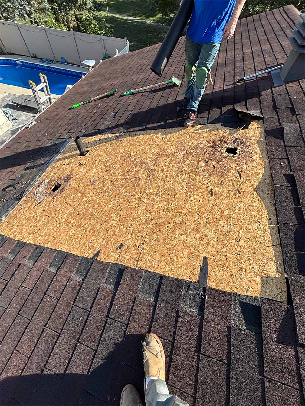 roof deck replacement during residential roof repair after removing damaged shingles