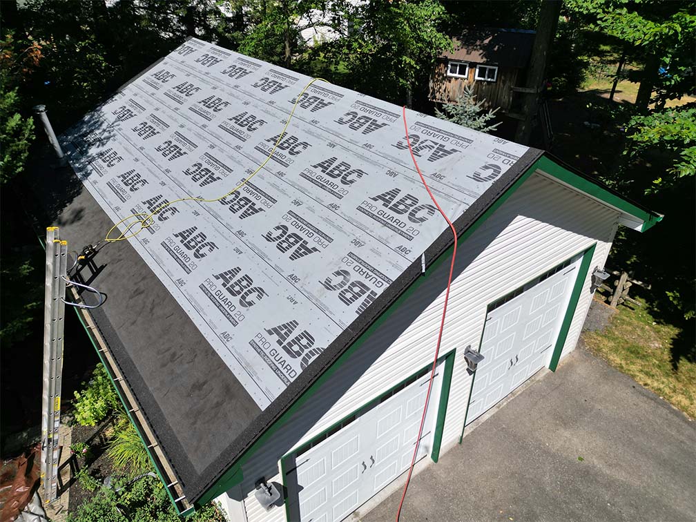 Synthetic roof underlayment installed during asphalt roof replacement